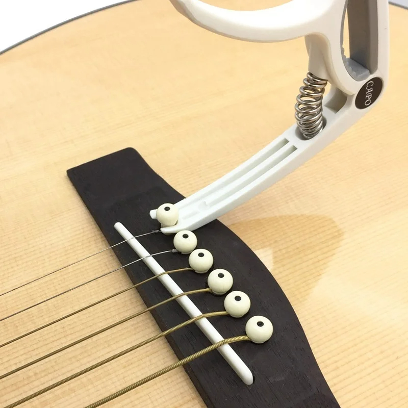 Plastic Gitaar Capo voor 6-sna - Guitar Tuner Clip recensie en prijs
